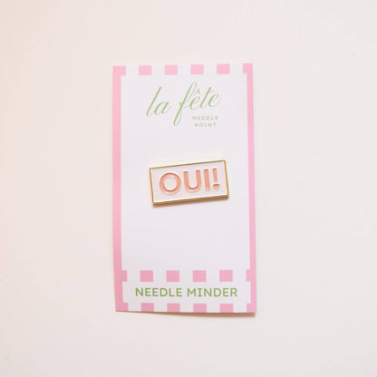 Oui! Needle Minder