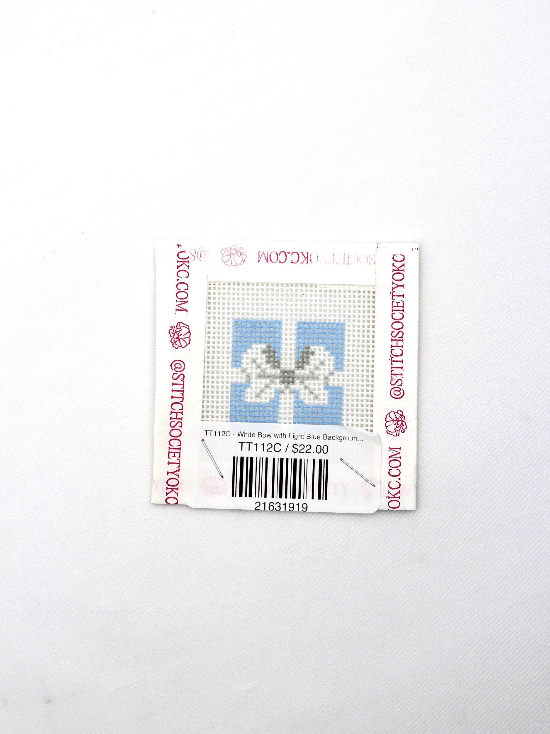 TT112C - White Bow with Light Blue Background Canvas